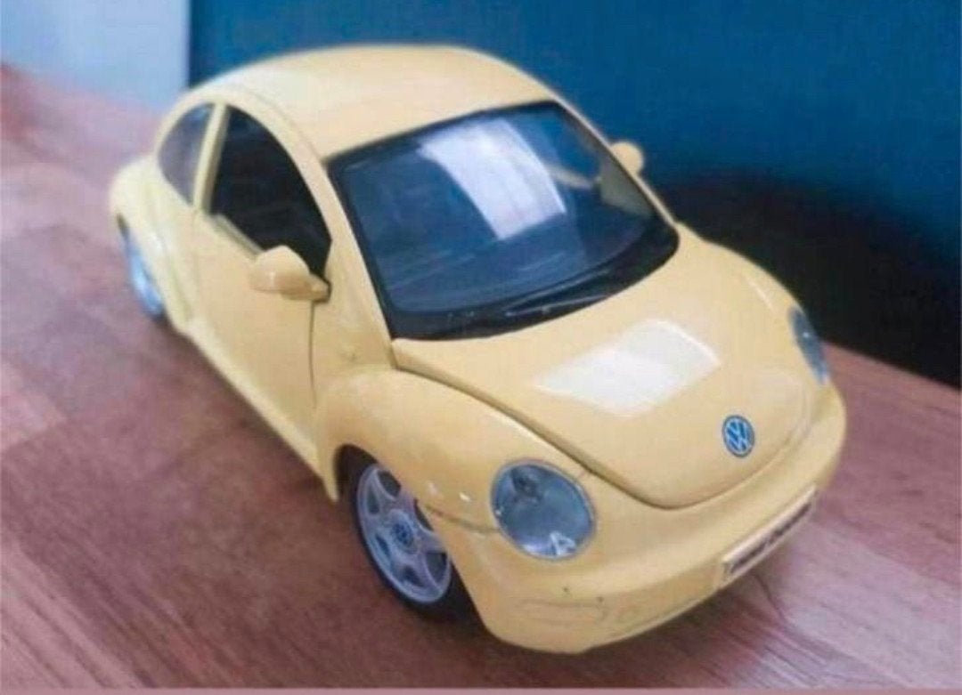 Volkswagen New-Beetle van Maisto schaal 1.25, Hobby en Vrije tijd, Modelauto's | 1:24, Ophalen of Verzenden, Zo goed als nieuw