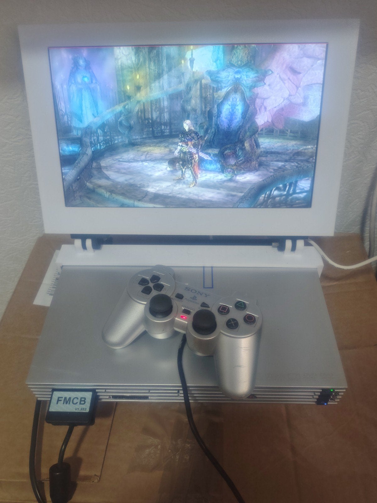 playstation 2 met 123 spellen + monitor., Ophalen of Verzenden, Zo goed als nieuw, Met 1 controller