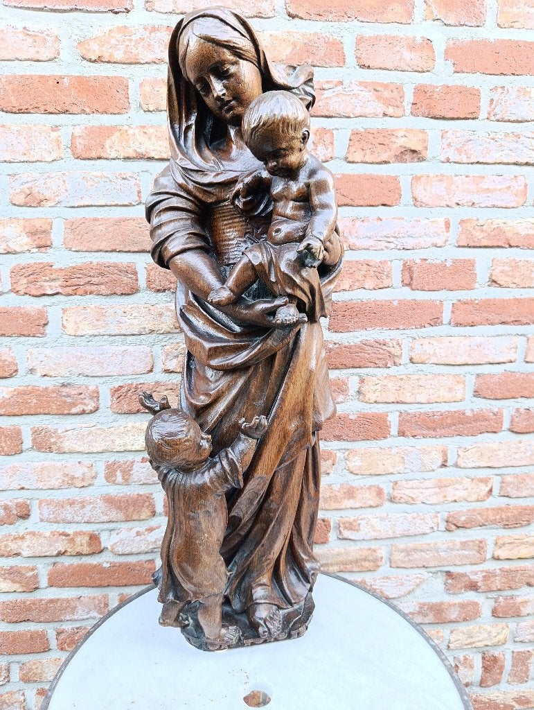 Houten Maria met kinderen, Ophalen