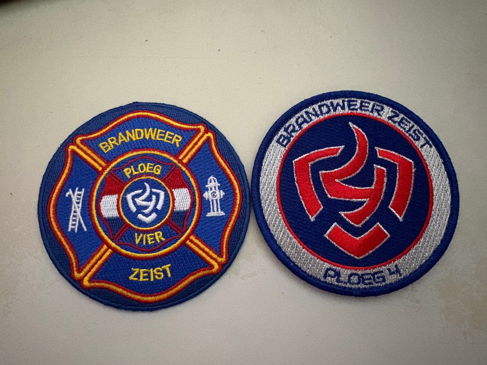 Setje brandweer Zeist ploeg 4, Verzenden, Landmacht, Nederland, Embleem of Badge