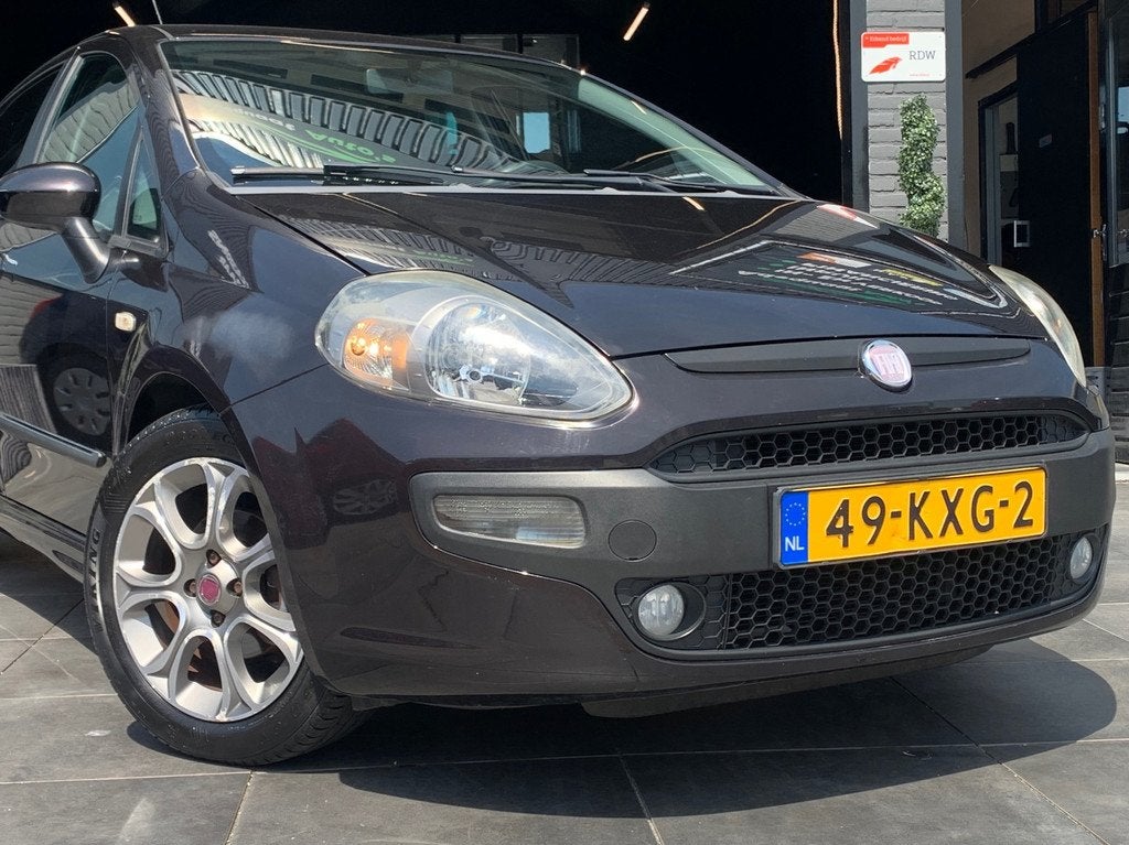 Fiat Punto Evo 1.4 Racing|1e eig|NAP|Cruise|Airco|El.Ramen, Auto's, Voorwielaandrijving, Euro 5, Stof, Huisgarantie