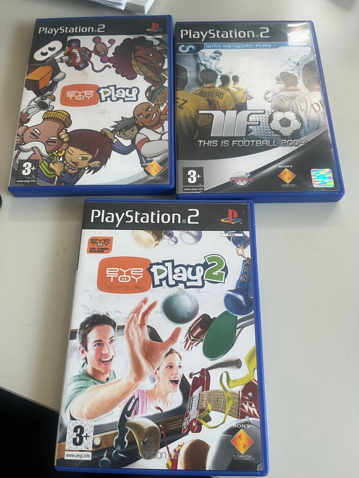 PlayStation 2 Games: EyeToy Play 1 & 2, This is Football 200, Spelcomputers en Games, Gebruikt, Overige genres, Eén computer, Ophalen of Verzenden