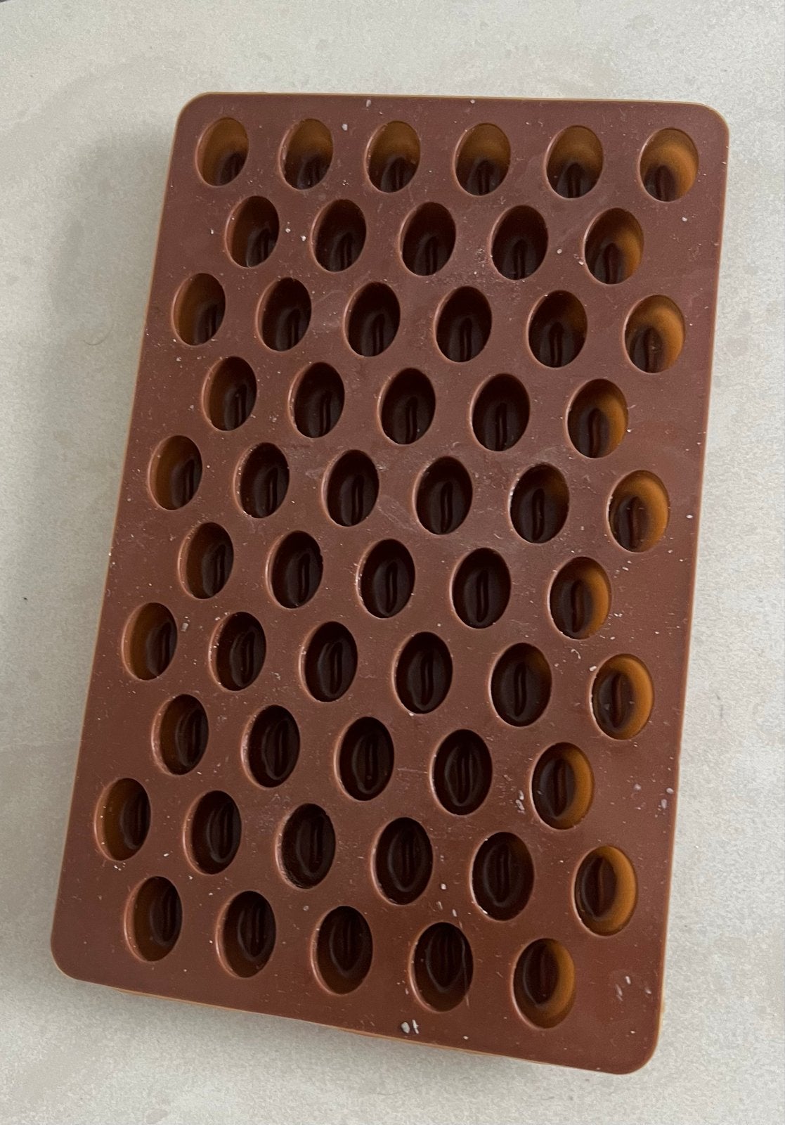 Siliconen mal voor koffieboonvormige snoepjes/chocolaatjes, Ophalen of Verzenden, Zo goed als nieuw