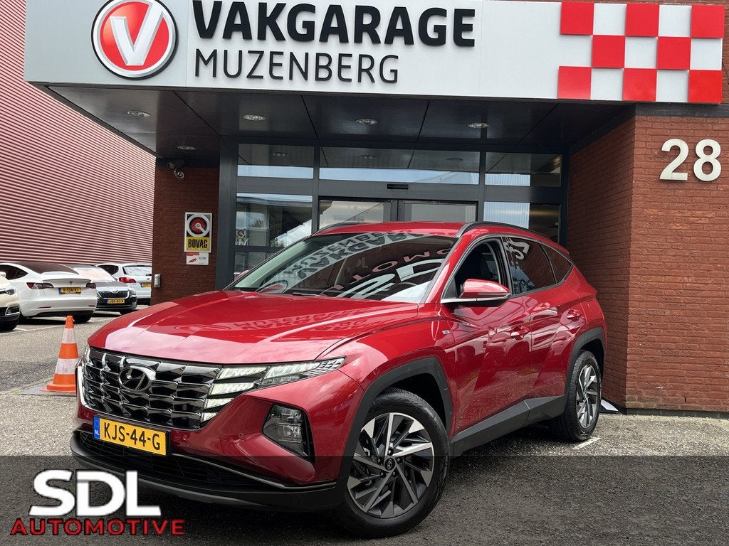Hyundai Tucson 1.6 T-GDI MHEV i-Motion // LED // NAVI + CARP, Auto's, Gebruikt, Zwart, 4 cilinders, Bedrijf