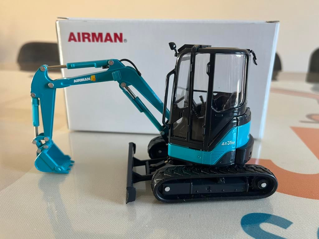 Airman AX 35 U minigraver Nieuw, Hobby en Vrije tijd, Modelauto's | 1:32, Ophalen of Verzenden, Nieuw, Tractor of Landbouw, Overige merken