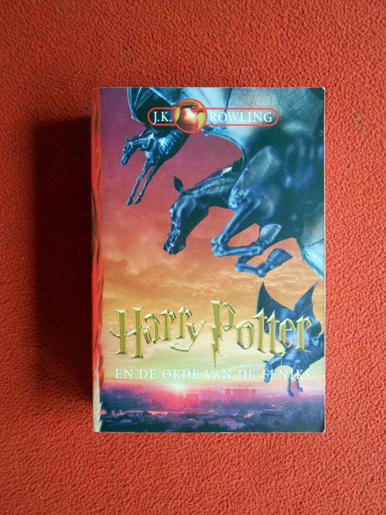 Harry Potter en de orde van de feniks (softcover, deel 5), Ophalen of Verzenden, Zo goed als nieuw, Fictie algemeen