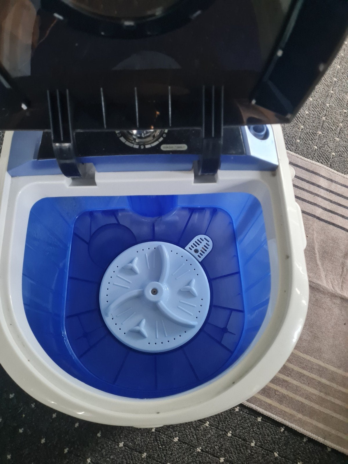 Camping wasmachine, Ophalen