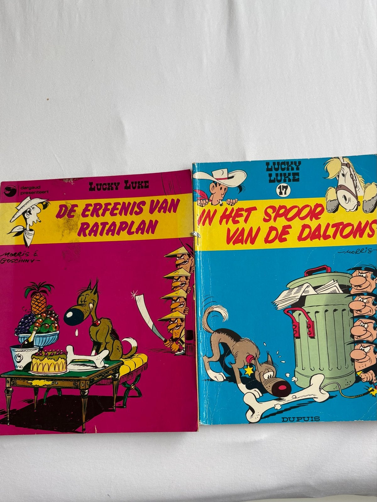 Lucky Luke: De Erfenis van Rataplan & In het Spoor van de Da, Meerdere stripboeken, Ophalen of Verzenden, Gelezen