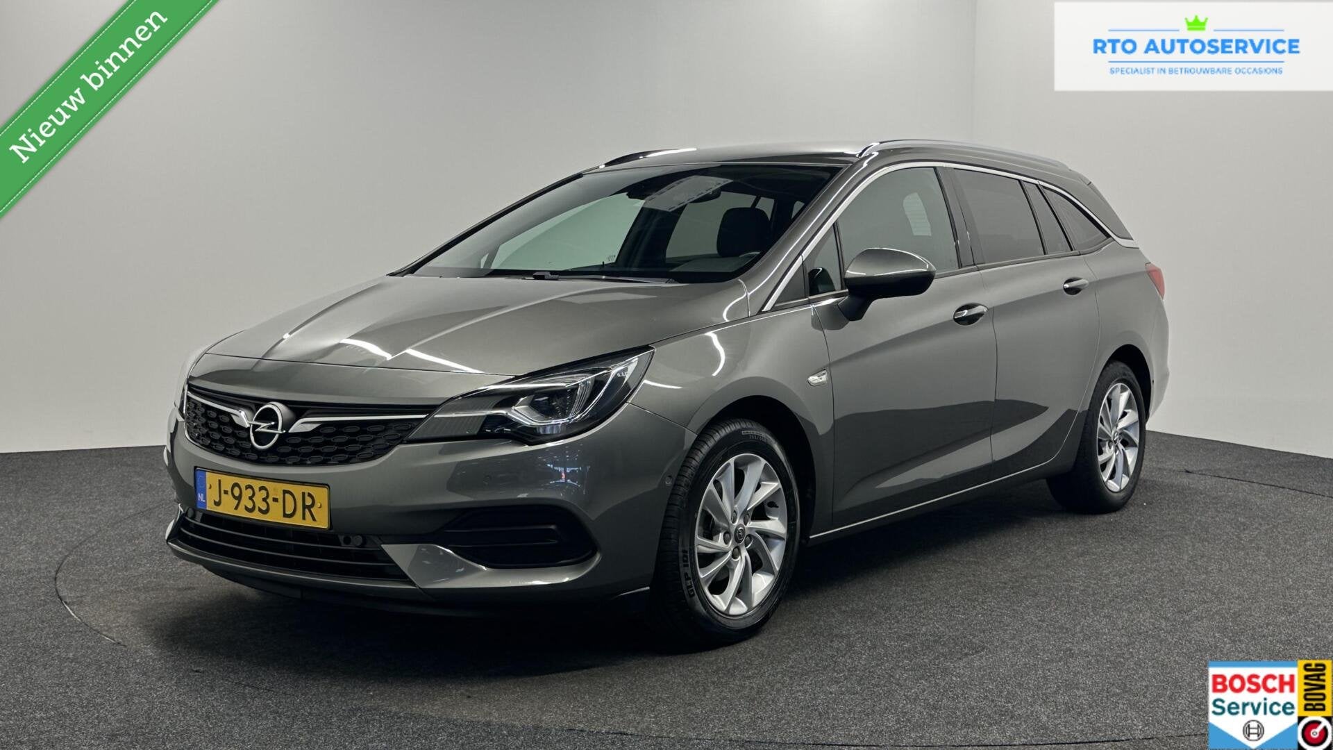 Opel Astra Sports Tourer 1.2 Elegance TREKHAAK CAMERA CLIMAT, Voorwielaandrijving, Euro 6, 1199 cc, Met garantie (alle)