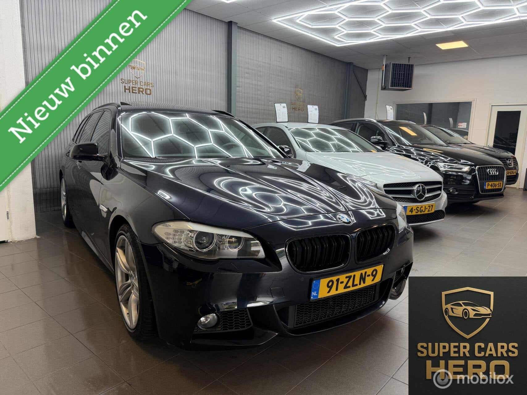 BMW 5-serie Touring 520i High Executive
