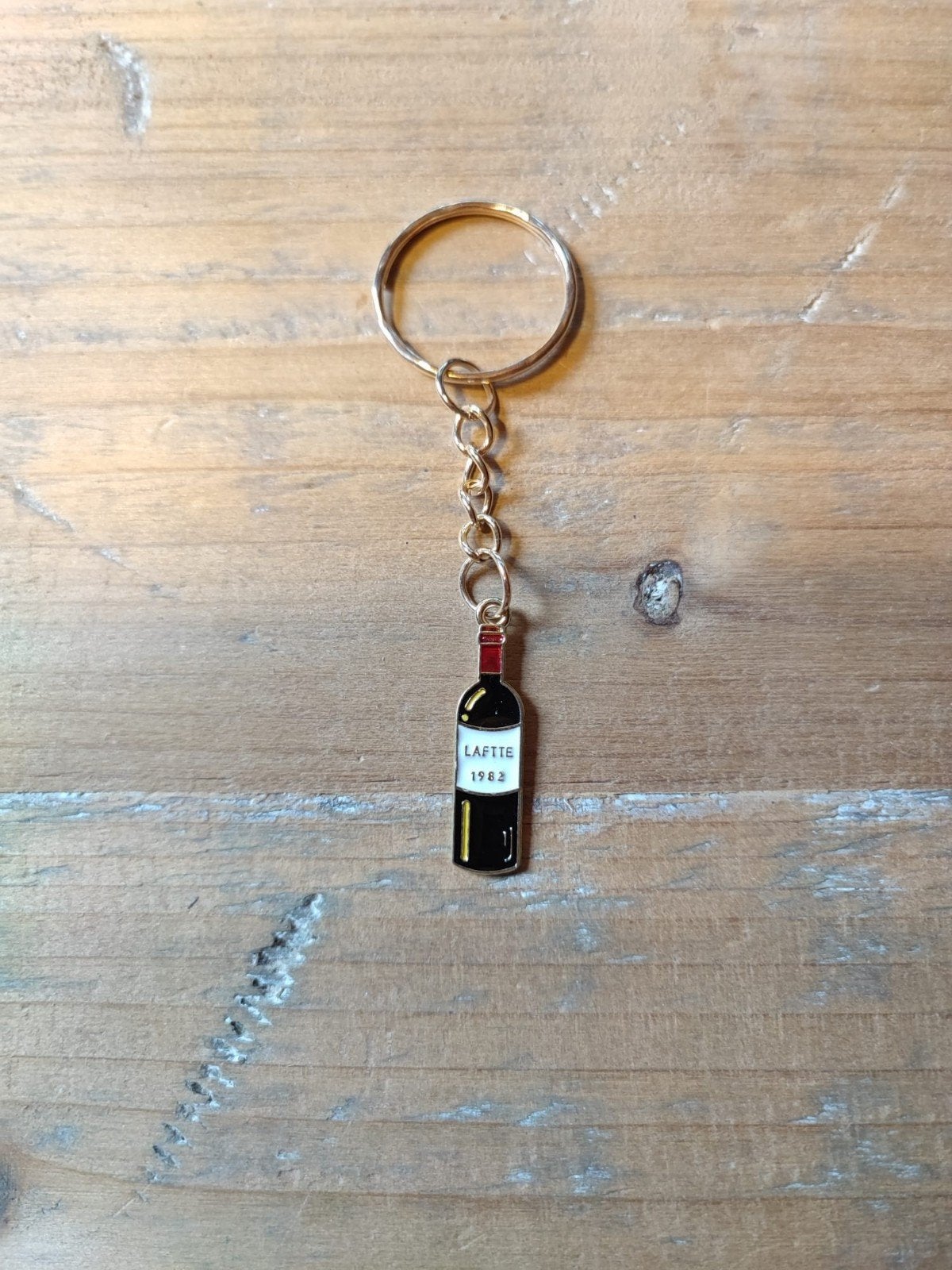 Nieuwe sleutelhanger wijnfles Lafite 1982, Verzamelen, Ophalen of Verzenden, Nieuw, Overige typen