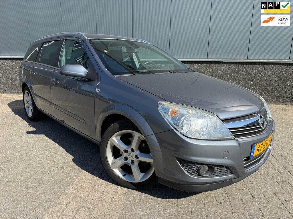 Opel Astra Wagon 1.6 Cosmo NETTE AUTO !, Auto's, Voorwielaandrijving, 15 km/l, Gebruikt, Zwart