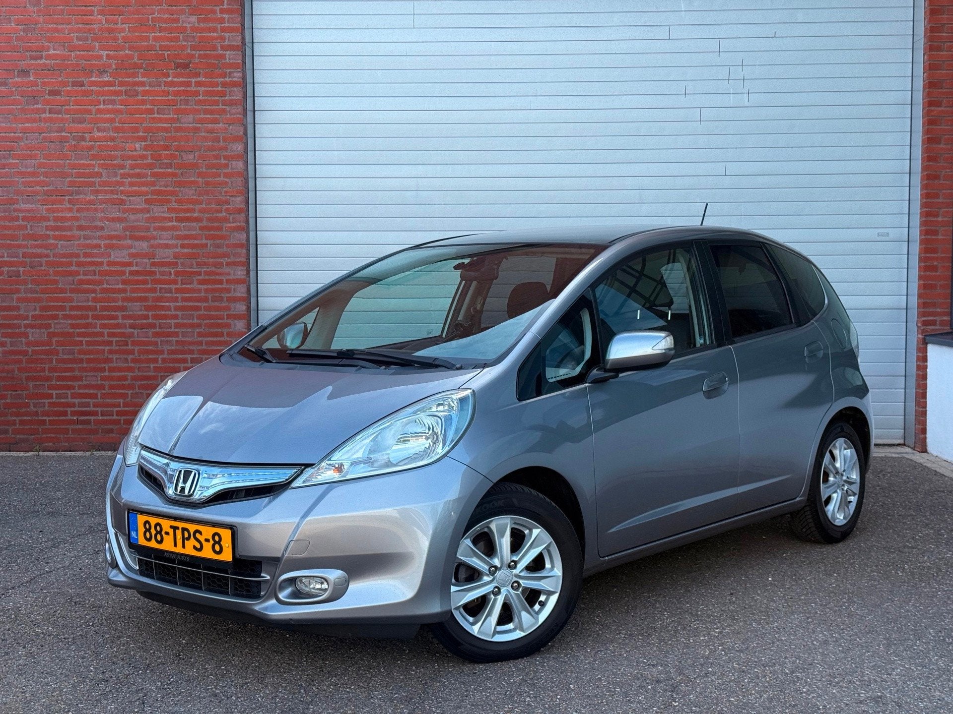 Honda Jazz 1.4 Hybrid Elegance| AIRCO| NAP| NEW APK| PANO| N, Auto's, Zwart, 4 cilinders, Alcantara, 49 €/maand