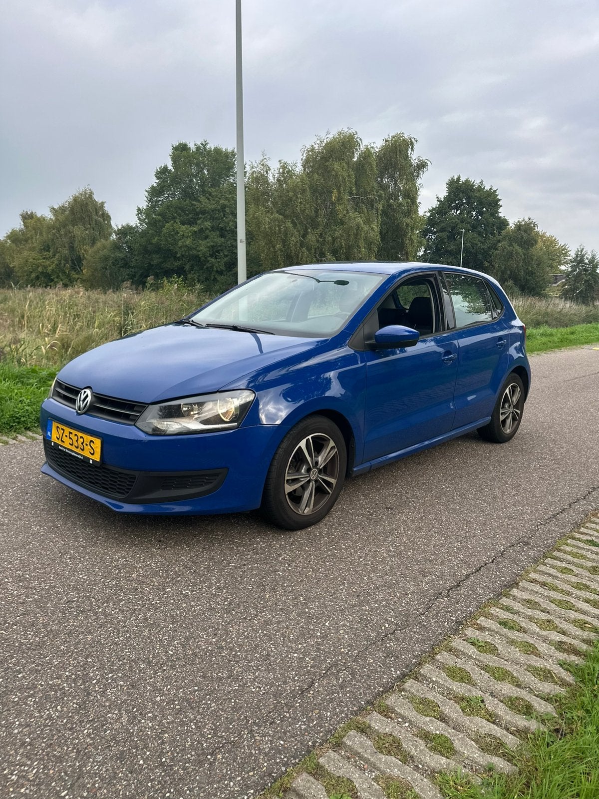 Volkswagen Polo 1.4 16V FSI 63KW 2010 Blauw, Auto's, Voorwielaandrijving, 970 kg, 40 €/maand, 4 cilinders
