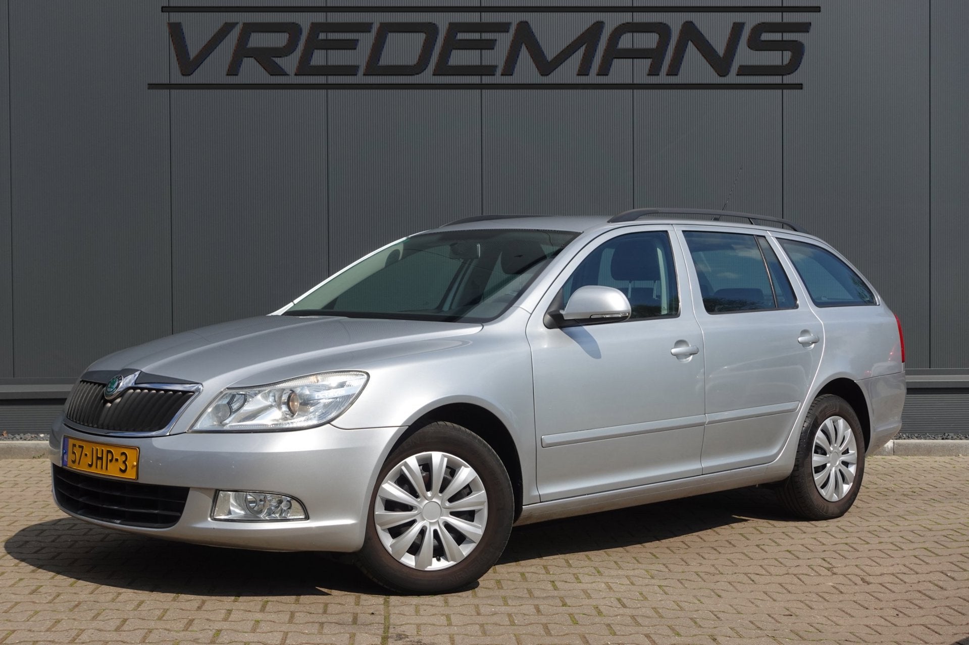 Skoda Octavia Combi 1.4 TSI Ambition DSG, Auto's, Skoda, Stof, 4 cilinders, 122 pk, Origineel Nederlands