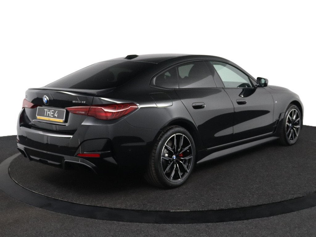BMW i4 eDrive35 M Sport Pro Edition | Comfort Pack, Auto's, BMW, Achterwielaandrijving, Zwart, 491 km, Zwart