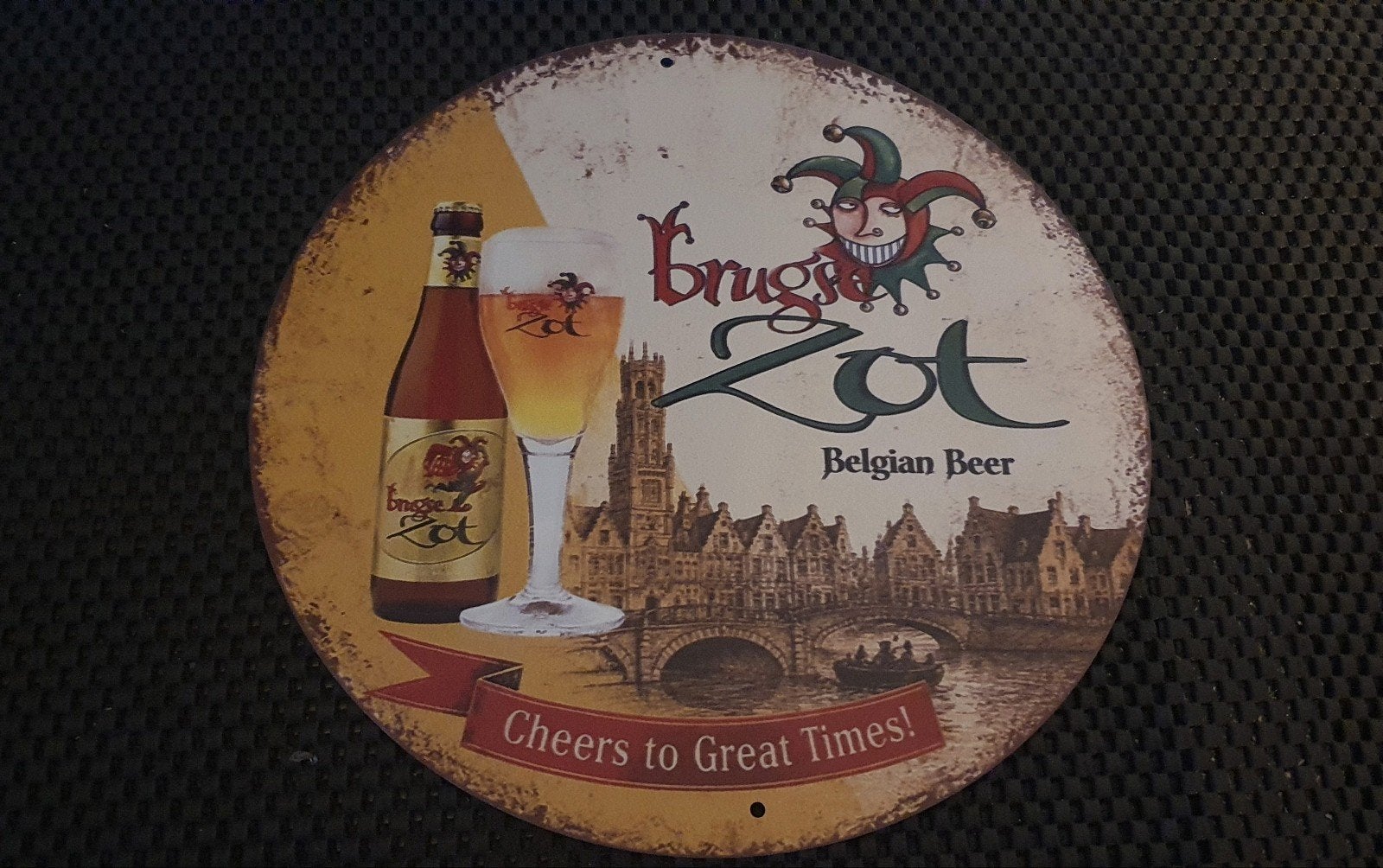 Wandbord metaal Brugse Zot bier - diameter 20 cm, Ophalen of Verzenden, Nieuw, Reclamebord, Plaat of Schild, Overige merken