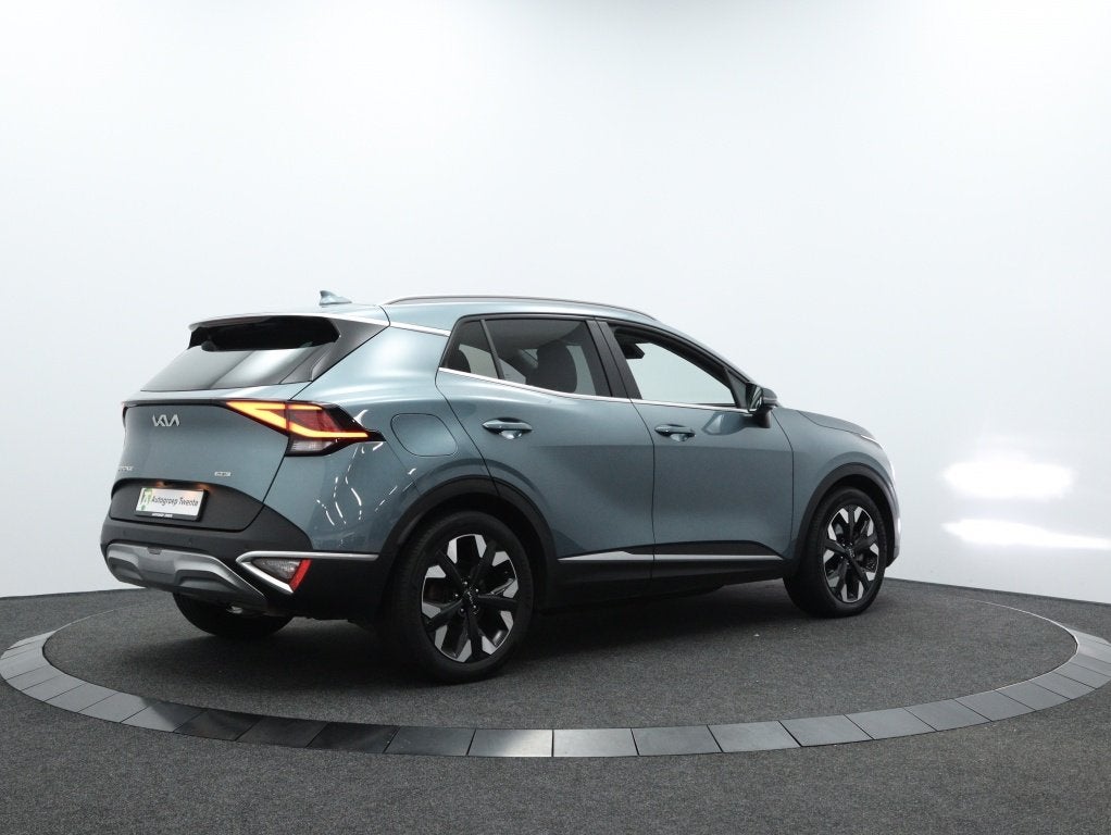 Kia Sportage 1.6 T-GDi PHEV Prestige AWD | Trekhaak | Naviga, Auto's, 4 cilinders, Blauw, Bedrijf, Grijs