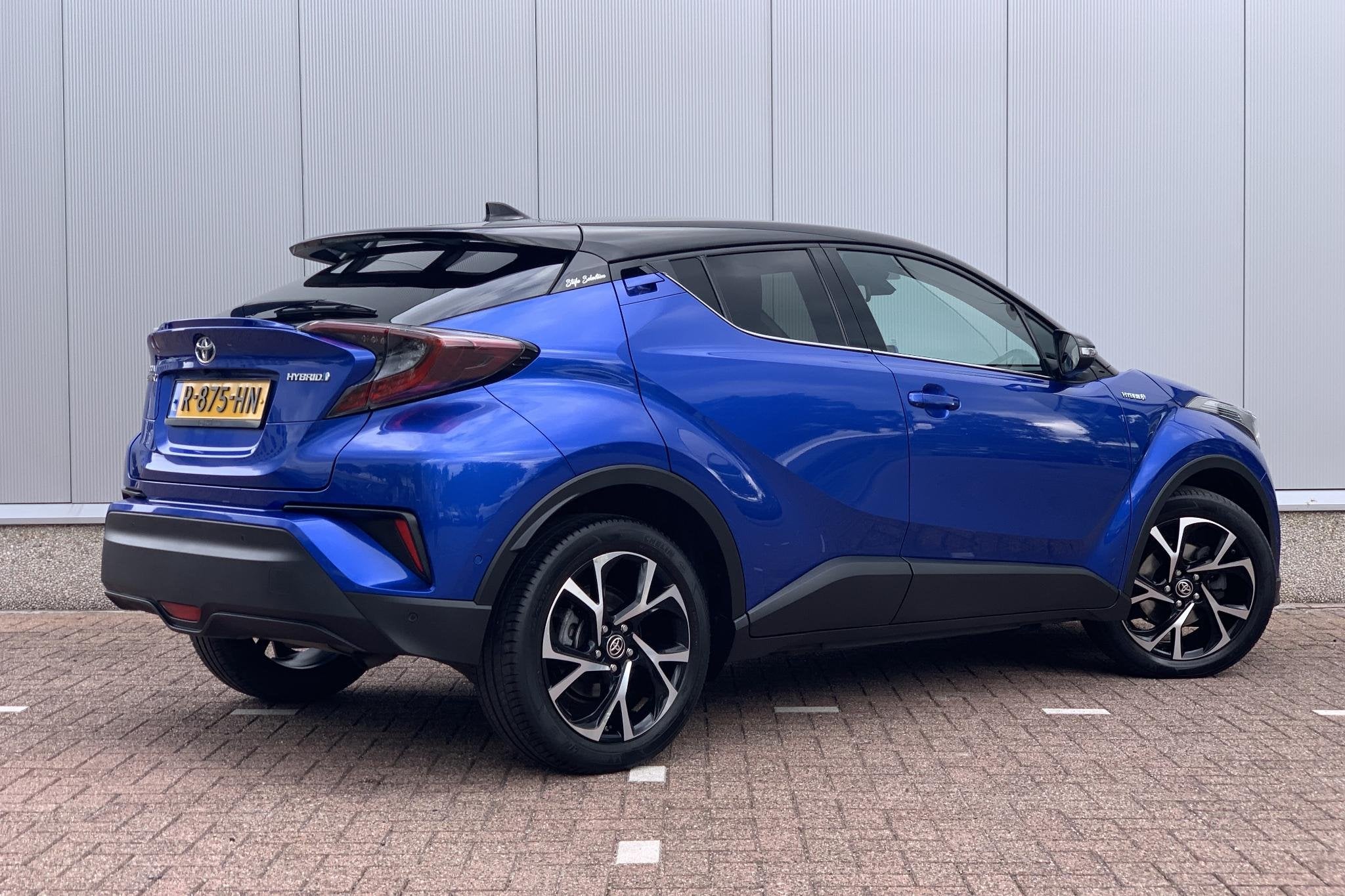 Toyota C-HR 1.8 Hybrid Bi-Tone | JBL Audio | Stuur en Stoelv, Auto's, Toyota, Stof, Euro 6, 4 cilinders, Blauw