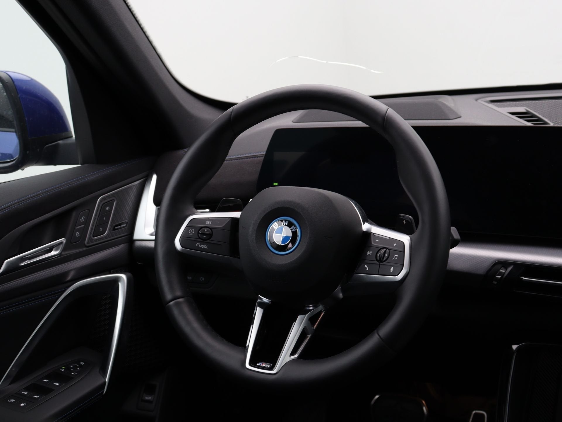 BMW X1 xDrive30e Accu conditie 100% (bj 2025, automaat), Auto's, Met garantie (alle), Blauw, Overige brandstoffen, Bedrijf