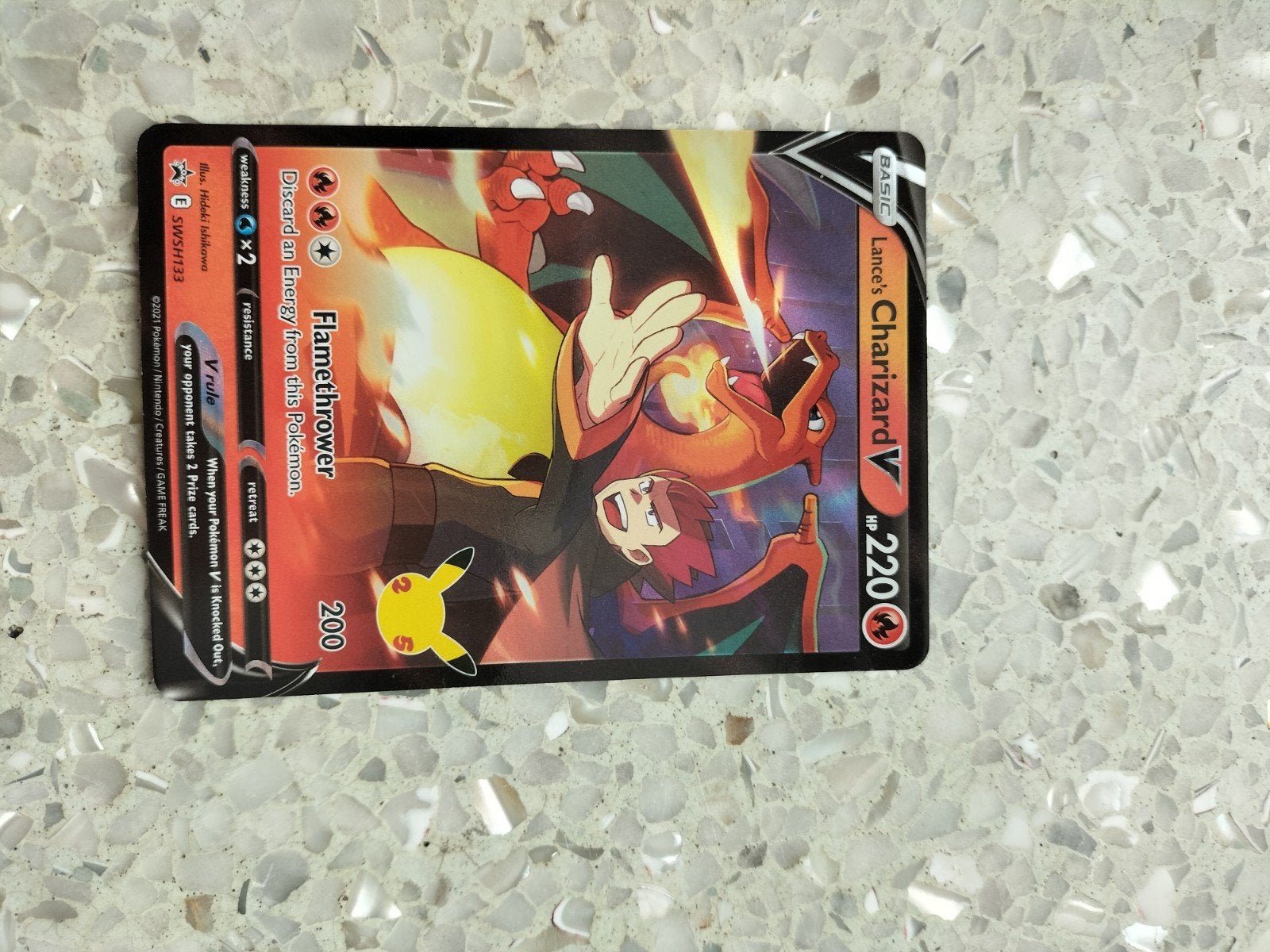 Lance's Charizard V Pokémon kaart Celebrations SWSH133, Ophalen, Zo goed als nieuw, Losse kaart