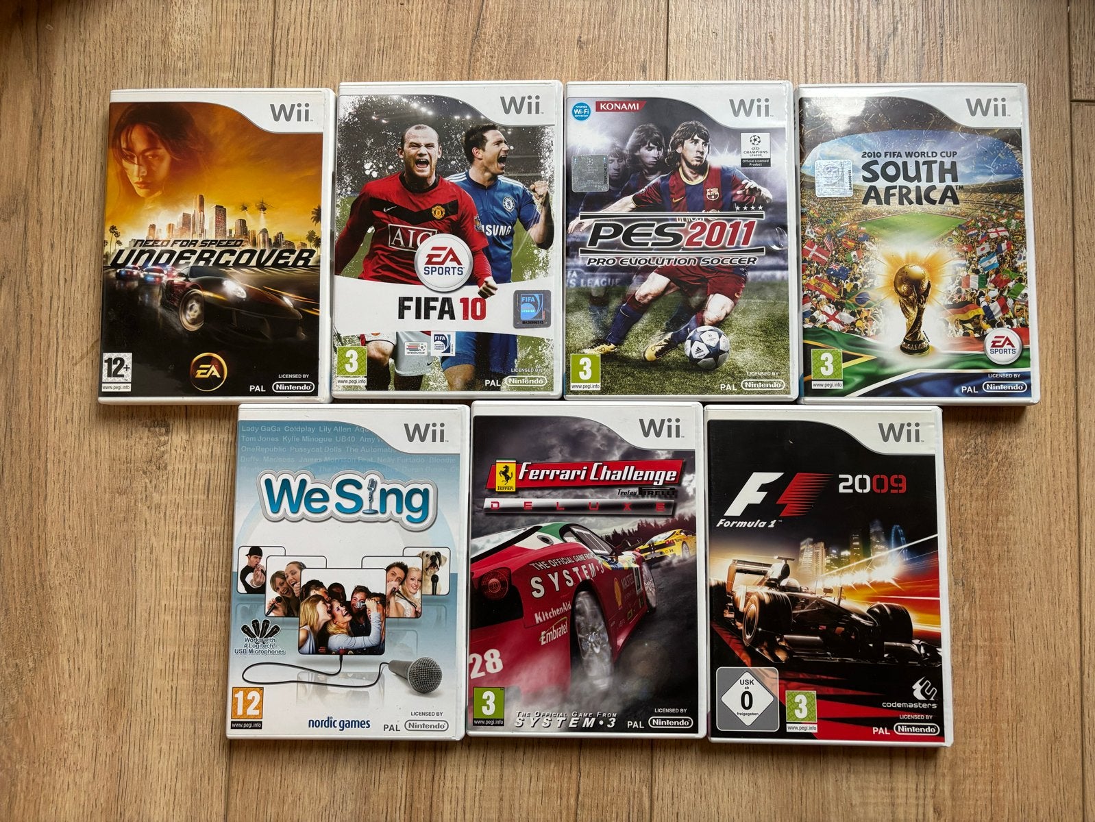 Wii Games - We Sing, FIFA, F1, PES, Ferrari Challenge, Spelcomputers en Games, Games | Nintendo Wii, Gebruikt, Overige genres