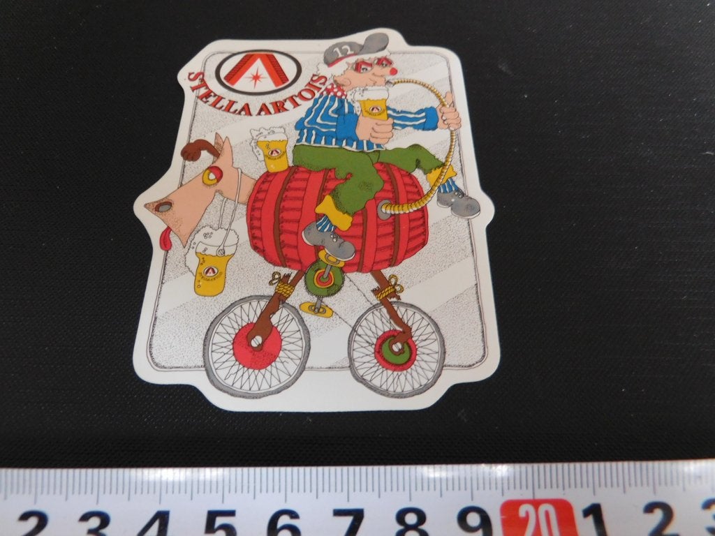 sticker bier stella artois strip fiets biervat hond, Ophalen, Zo goed als nieuw