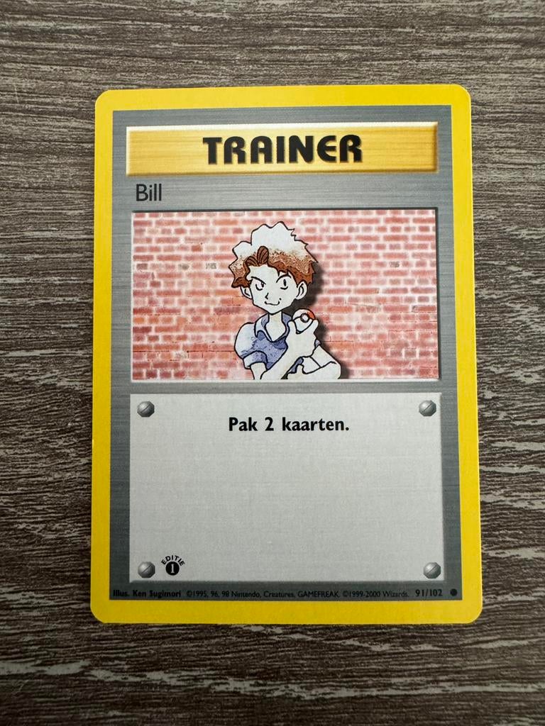 Trainer Bill 91/102 uit Base Set 1st Editie NL in Mint cond., Ophalen of Verzenden, Zo goed als nieuw, Losse kaart