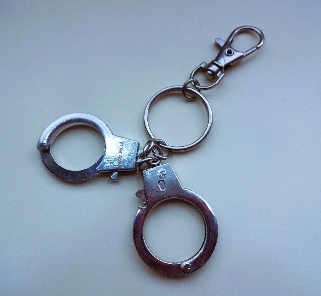 Sleutelhanger * mini-handboeien., Verzamelen, Verzenden, Zo goed als nieuw, Overige typen