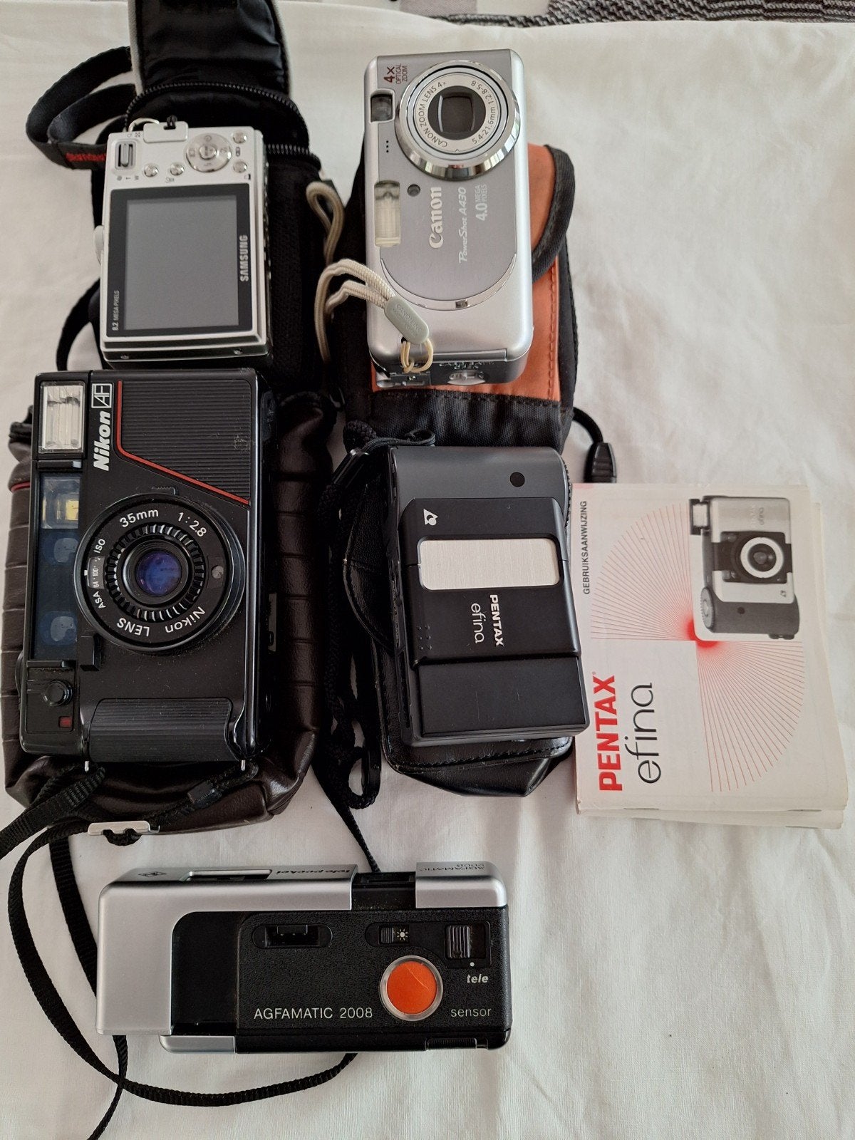Diverse camera's: Nikon, Canon, Samsung, Pentax, Agfamatic, Ophalen of Verzenden, Gebruikt, Compact, Nikon
