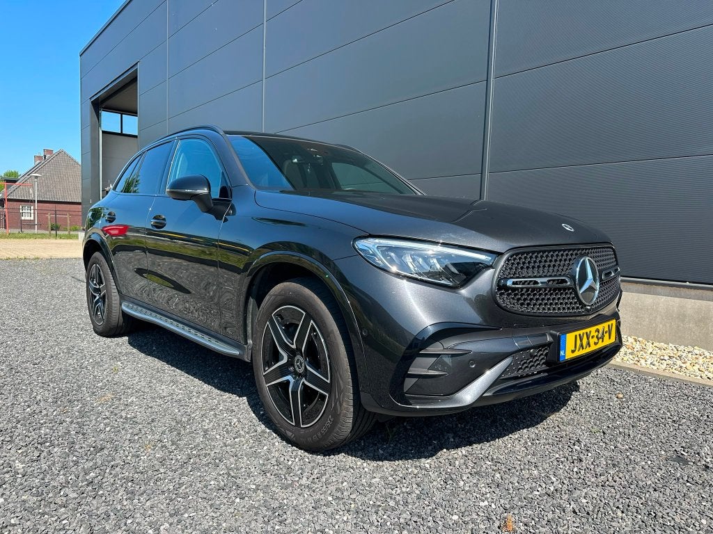 Mercedes-Benz GLC 300 e 313pk 4MATIC 9G-TRONIC 2024 Grijs, Auto's, Automaat, Zwart, 2000 kg, GLC