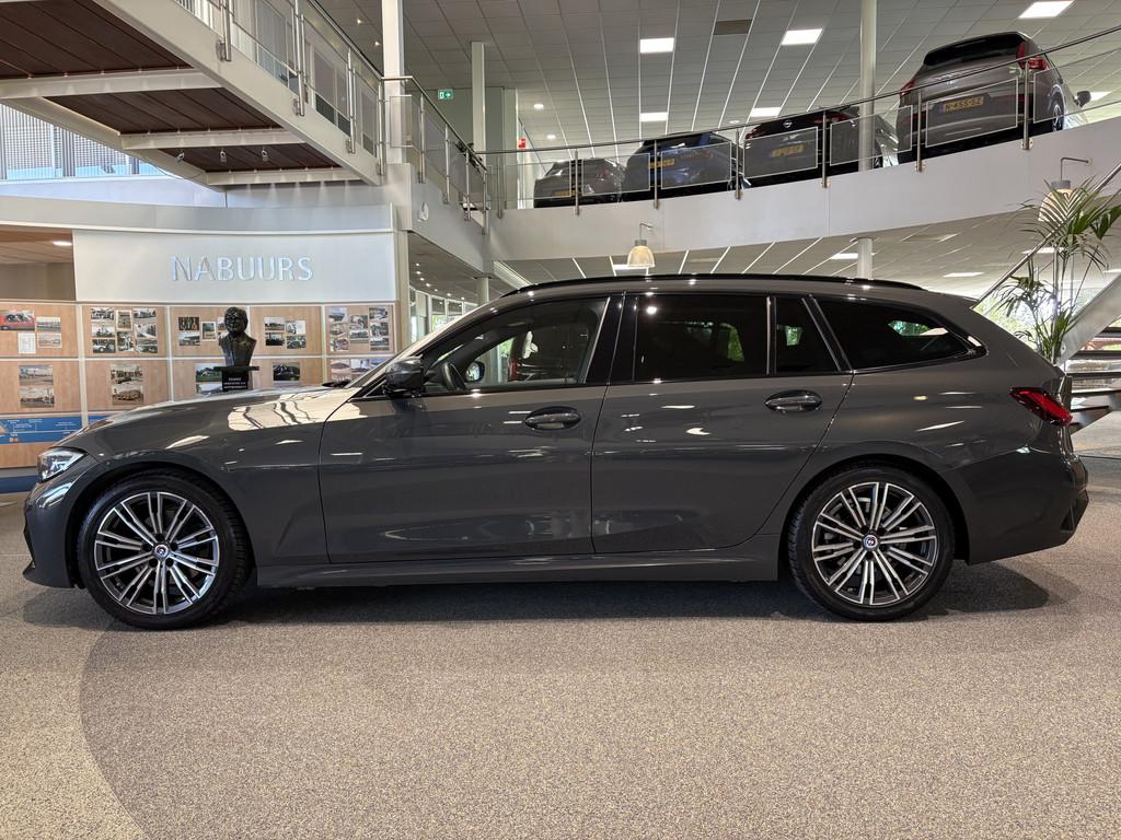 BMW 3 Serie Touring 320i High Executive M sport, Dravitgrau,, Auto's, BMW, Automaat, Gebruikt, Euro 6, 4 cilinders
