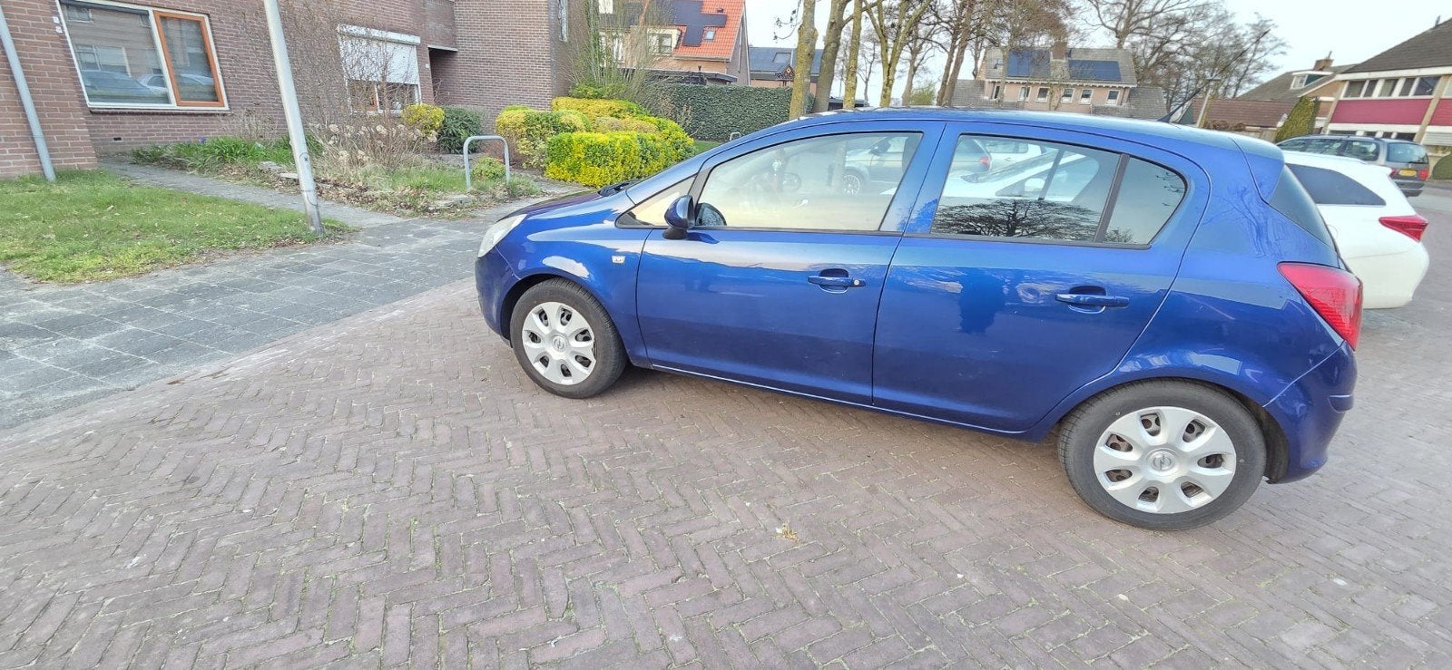 Opel Corsa 1.2 16V 5D 2009 Blauw, Auto's, Voorwielaandrijving, 4 cilinders, Blauw, 1229 cc
