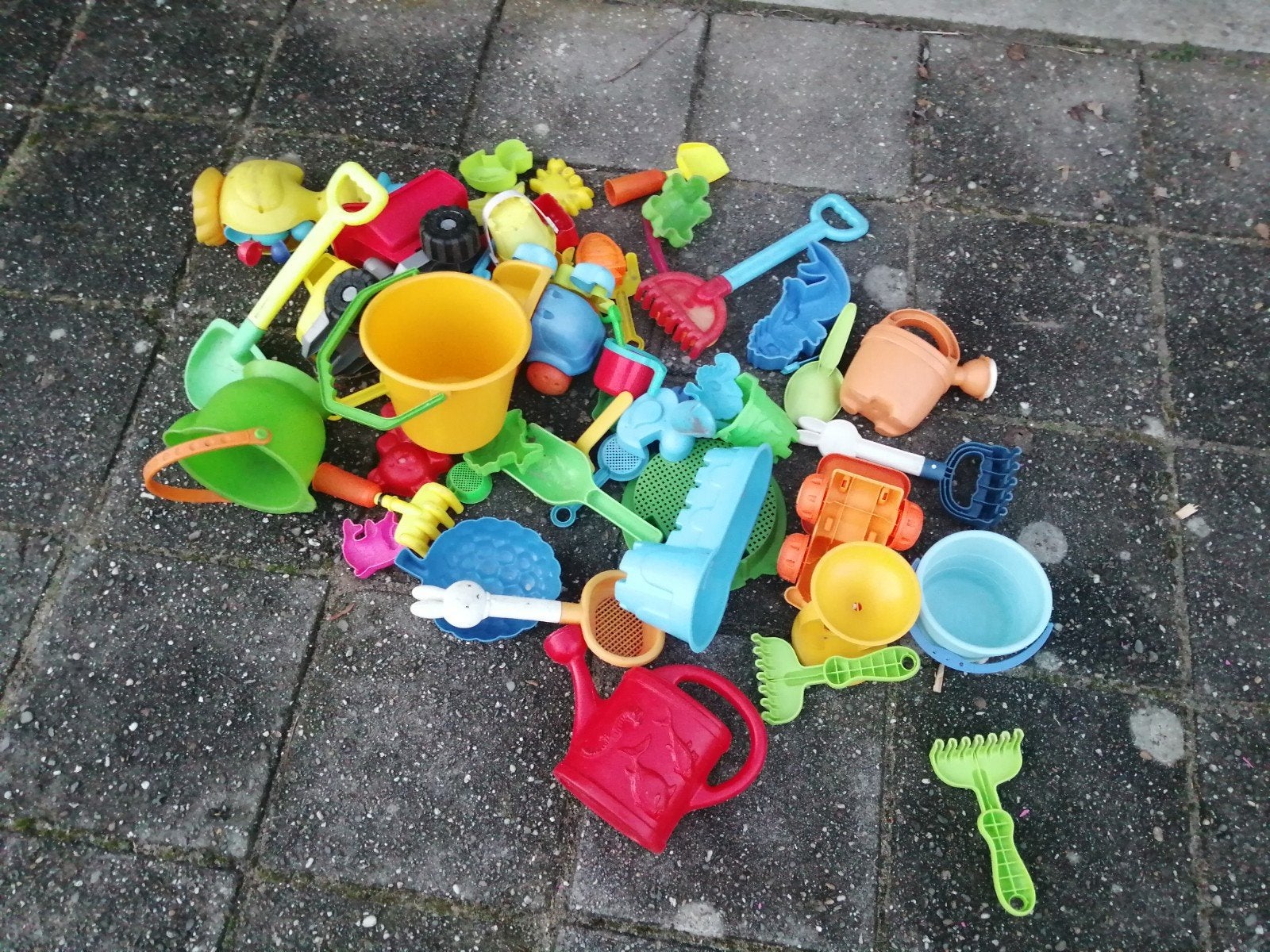 Grote zak zandspulletjes voor in de zandbak, Ophalen