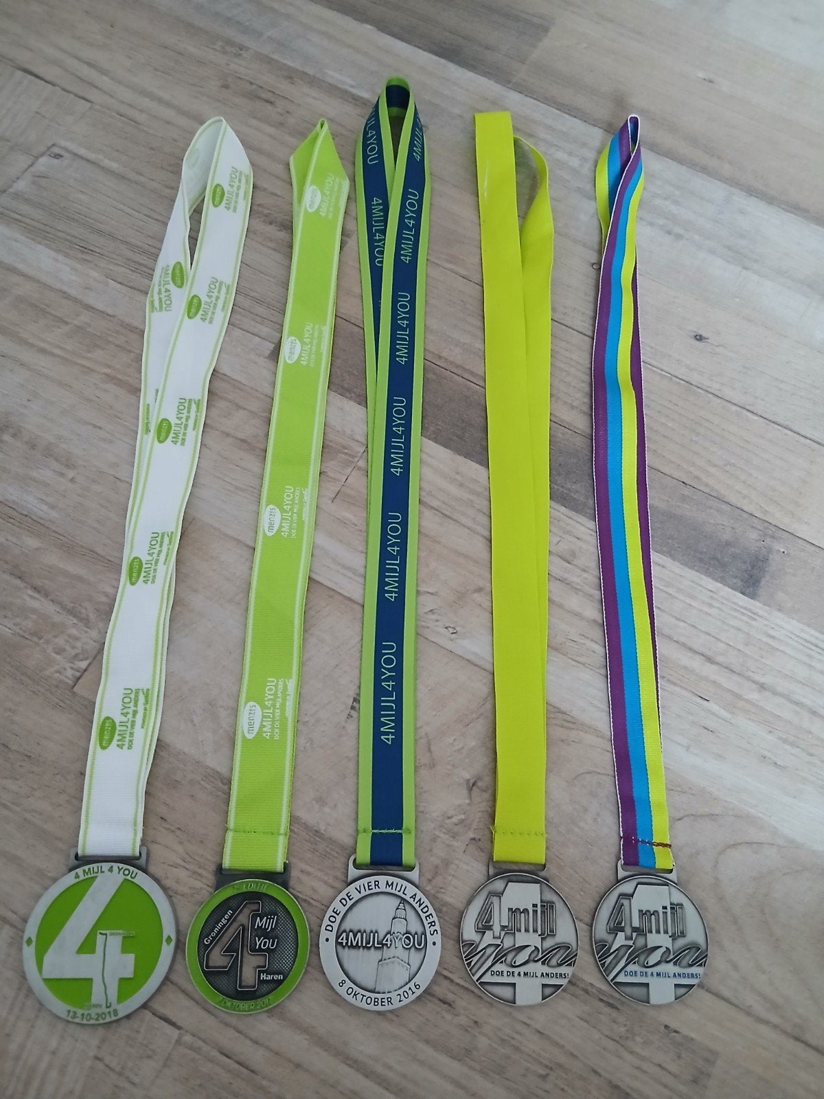 5 medaille's van 4mijl4you groningen, Ophalen, Overige materialen