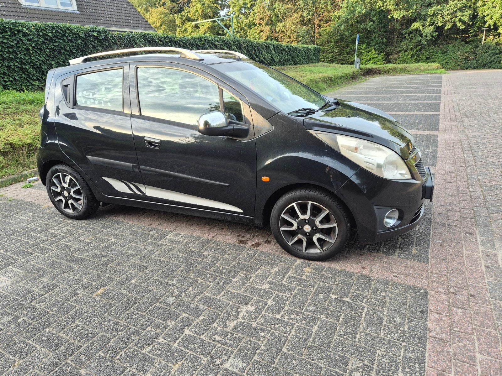 Nu of nooit :Chevrolet Spark 1.0 Bifuel 2010 Zwart, Auto's, 15 km/l, 37 €/maand, 4 cilinders, Zwart