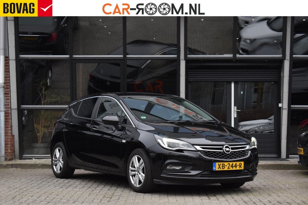 Opel Astra 1.4 Turbo Online Edition Automaat Cruise, Stof, Gebruikt, 620 kg, Zwart