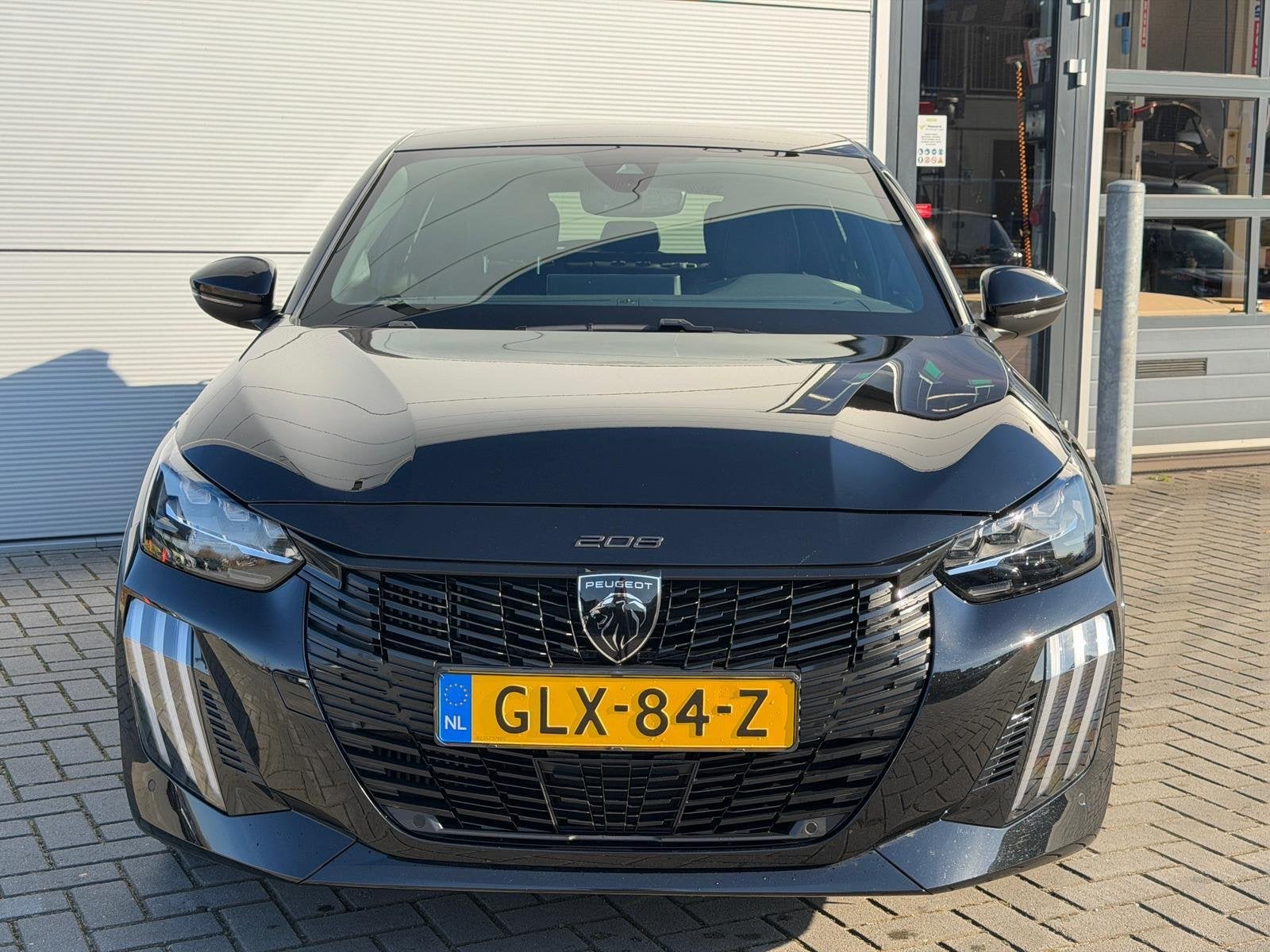 Peugeot 208 1.2T 100pk Hybrid Automaat GT | Climate control, Auto's, Gebruikt, 1199 cc, Parkeersensor, Zwart