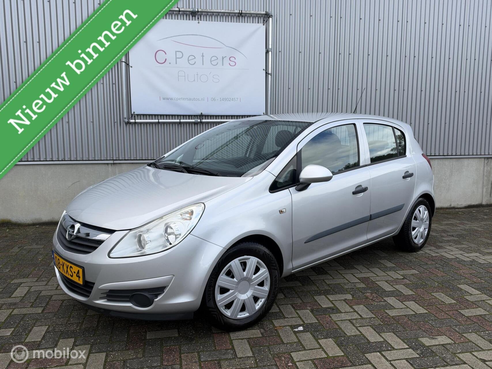 Opel Corsa 1.2-16V Selection 2010 / 5deurs / 4Seizoensbanden, Auto's, Voorwielaandrijving, Euro 5, Gebruikt, 4 cilinders