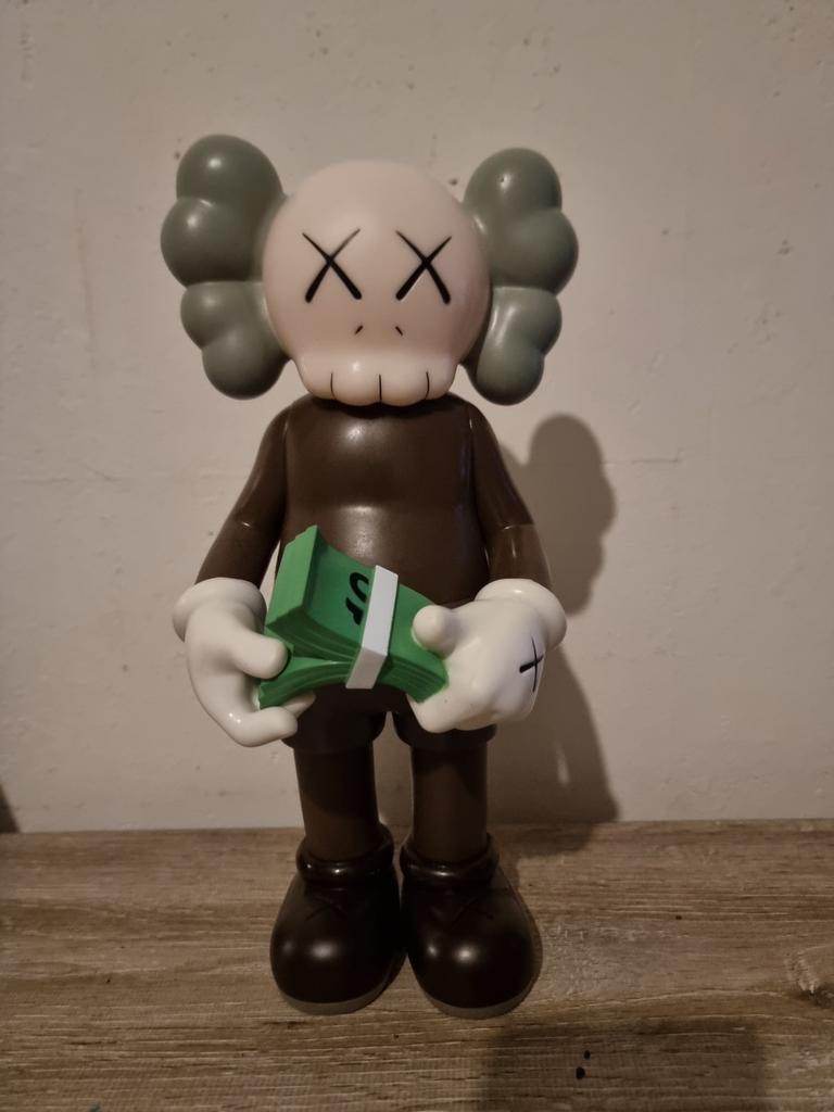 Kaws cash, Ophalen of Verzenden