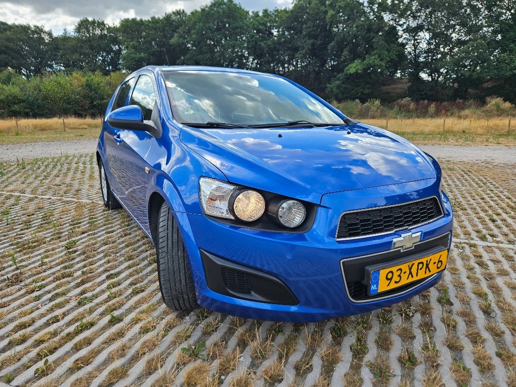 Chevrolet Aveo hatch 2012 (Carplay/Android Auto/APK 04-27), Auto's, Chevrolet, Voorwielaandrijving, Euro 5, Stof, 40 €/maand