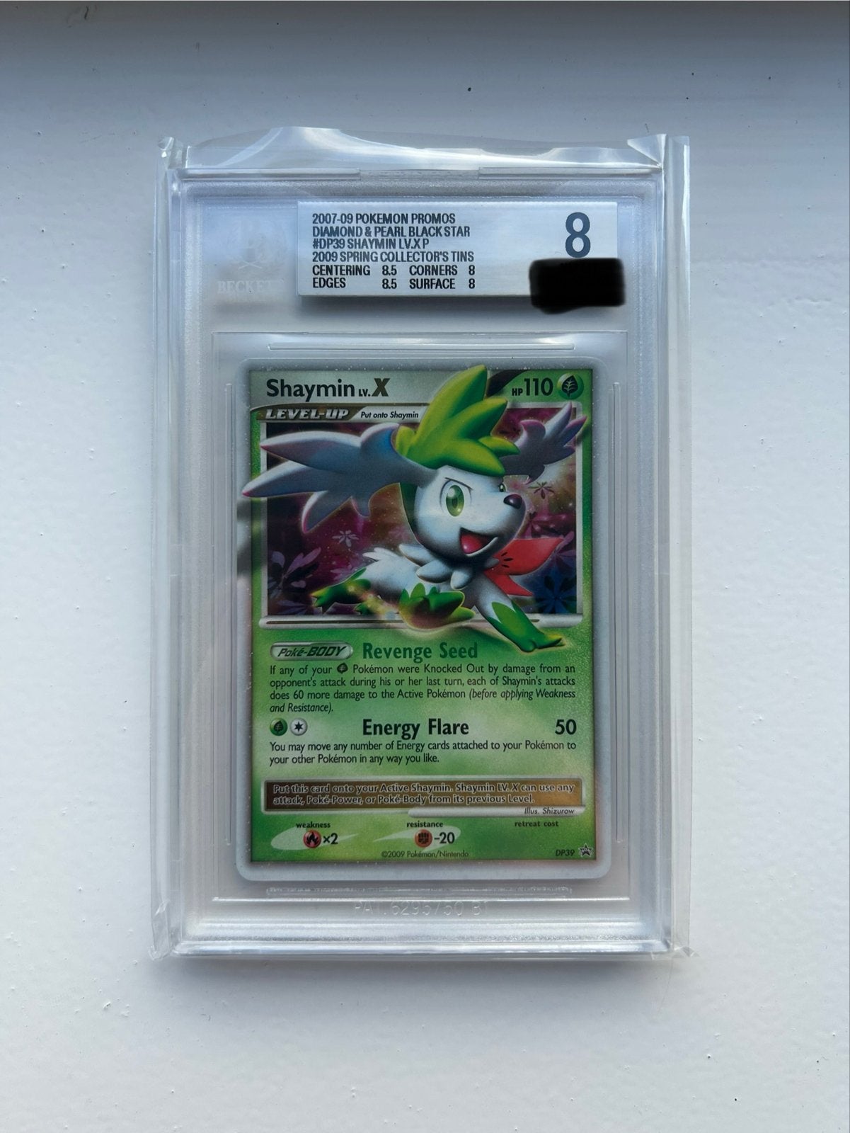 Shaymin LV.X DP39 Black Star Promo Beckett Graded 8 Pokémon, Hobby en Vrije tijd, Verzenden, Zo goed als nieuw, Losse kaart