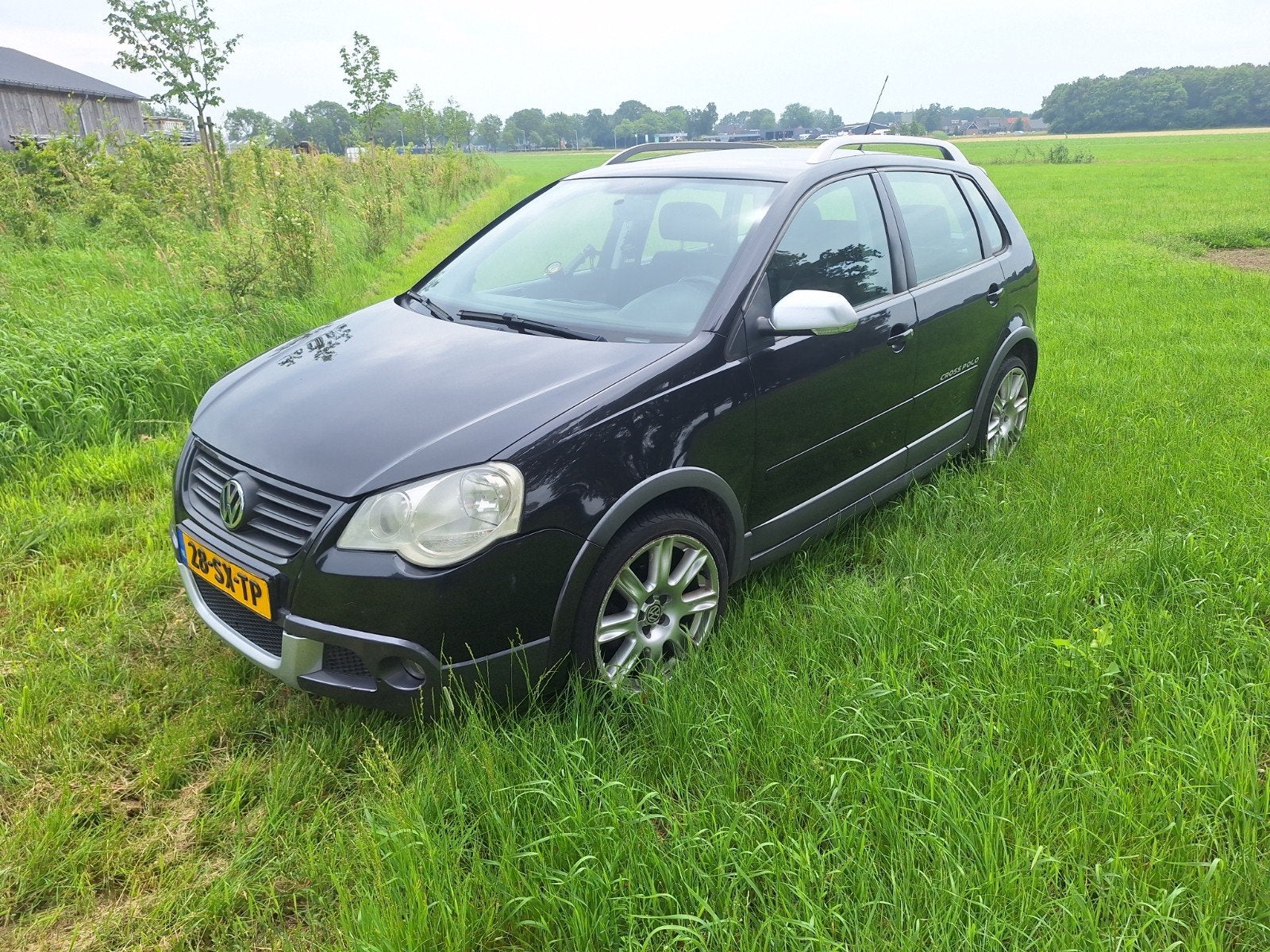 Volkswagen Polo 1.4 FUN 74KW 2006 Zwart apk tot 13 11 2026, Voorwielaandrijving, 15 km/l, 1072 kg, 100 pk