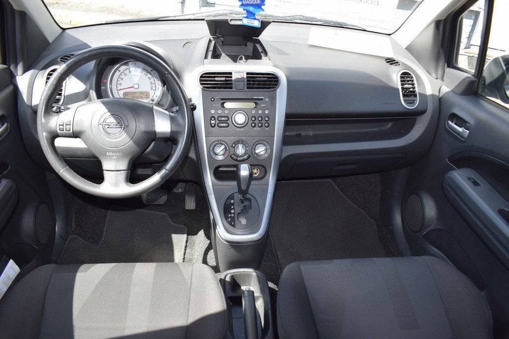 Opel Agila AUTOMAAT 1.2 Enjoy AIRCO (bj 2009), Auto's, 4 cilinders, Wit, Bedrijf, Geïmporteerd