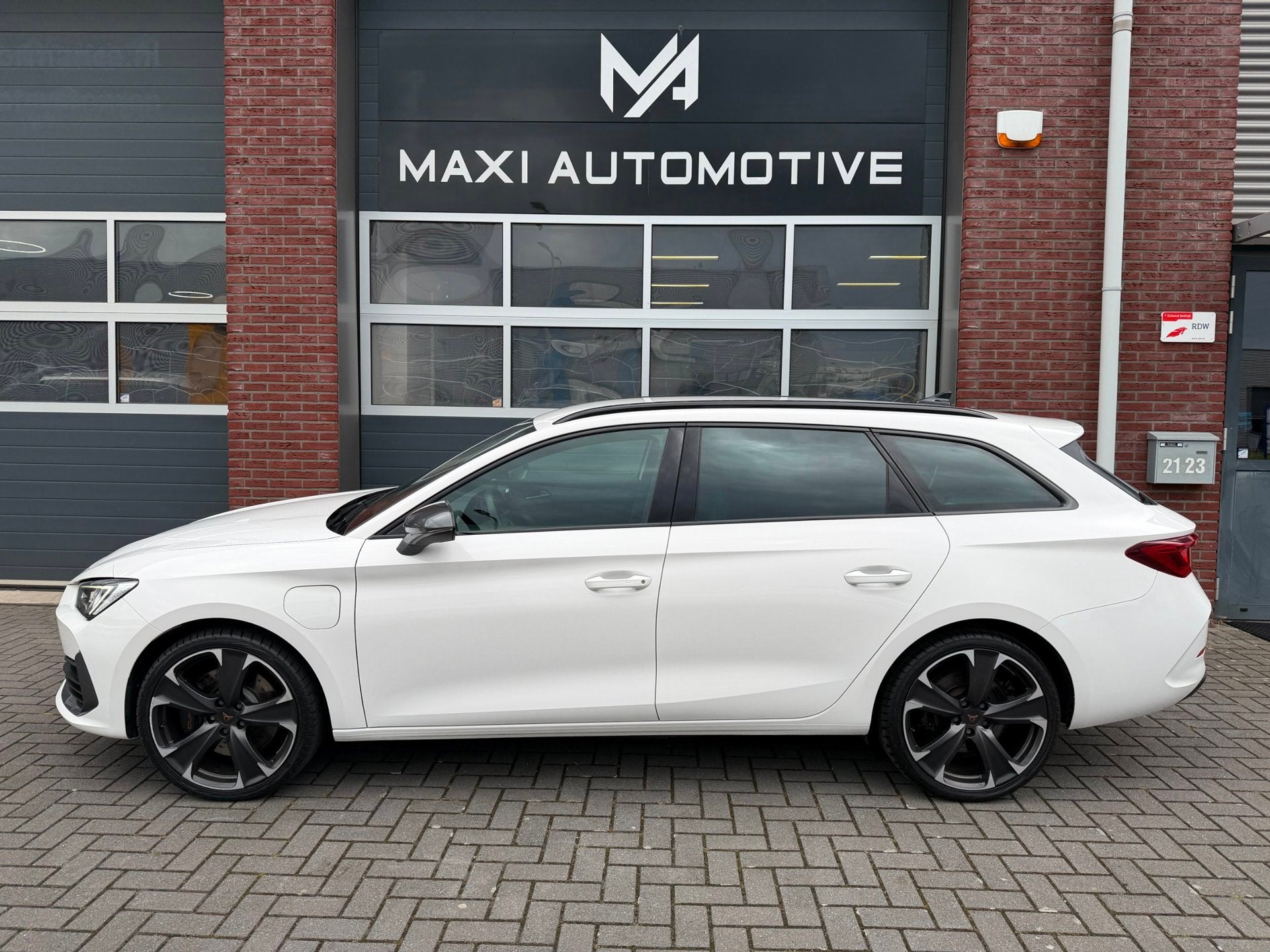 Cupra Leon Sportstourer 1.4 e-Hybrid 245 LED Sfeer Navi PDC, Auto's, Dealer onderhouden, Gebruikt, 4 cilinders, 150 pk