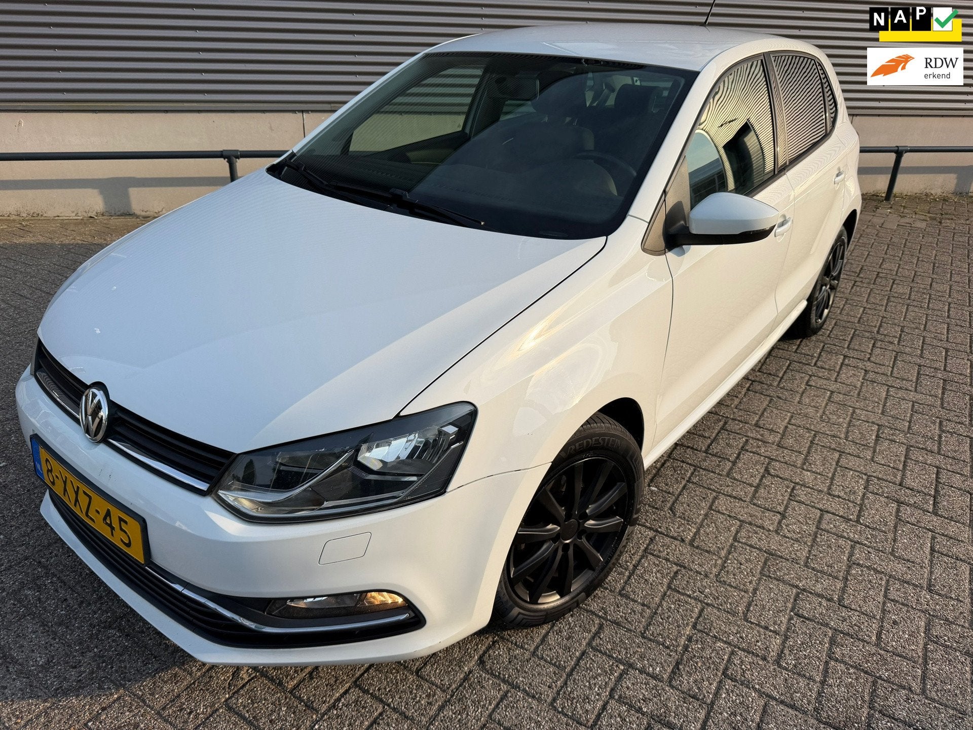 Volkswagen Polo 1.2 TSI Comfortline, Auto's, Stof, 4 cilinders, Wit, Origineel Nederlands
