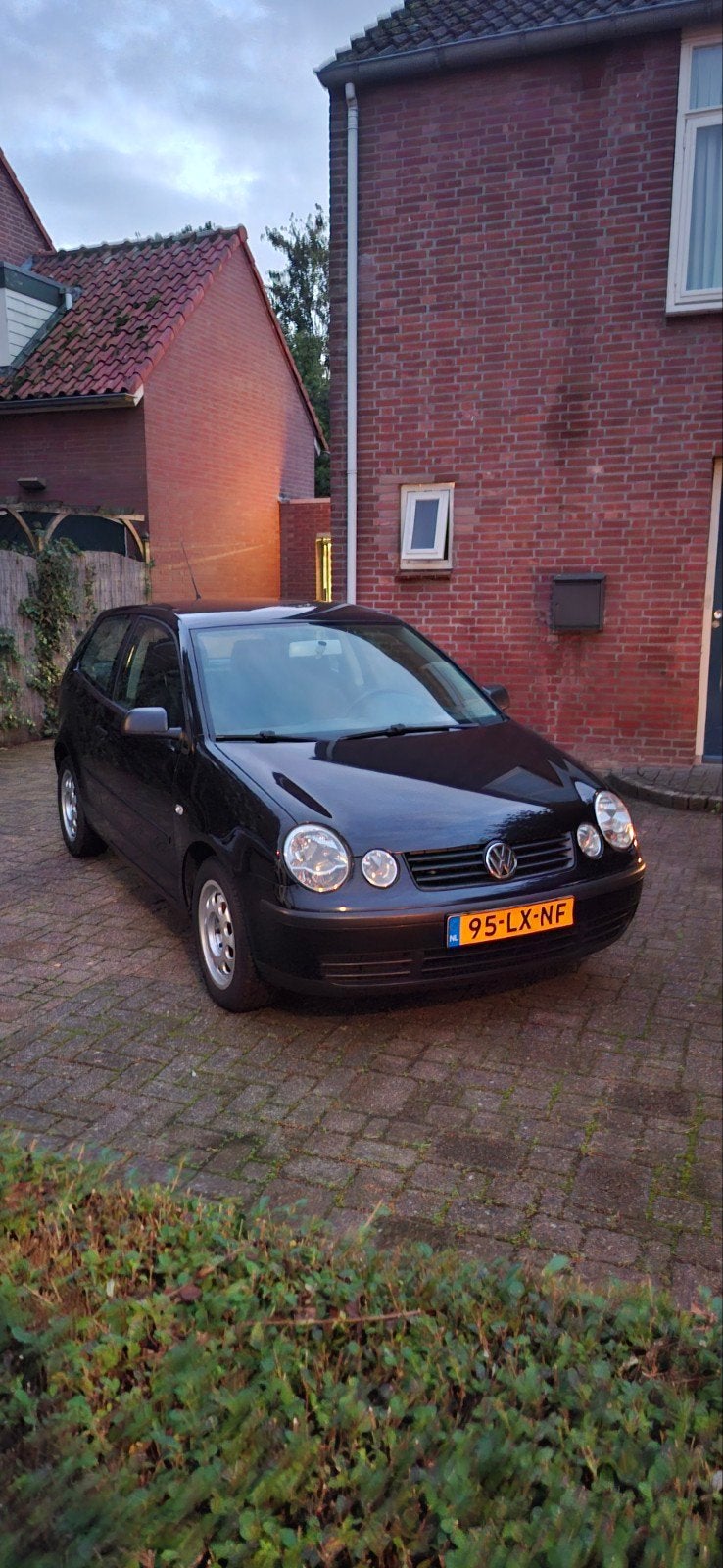 Volkswagen Polo 1.4 55KW 2003 Zwart, Auto's, Voorwielaandrijving, 4 cilinders, Zwart, Origineel Nederlands