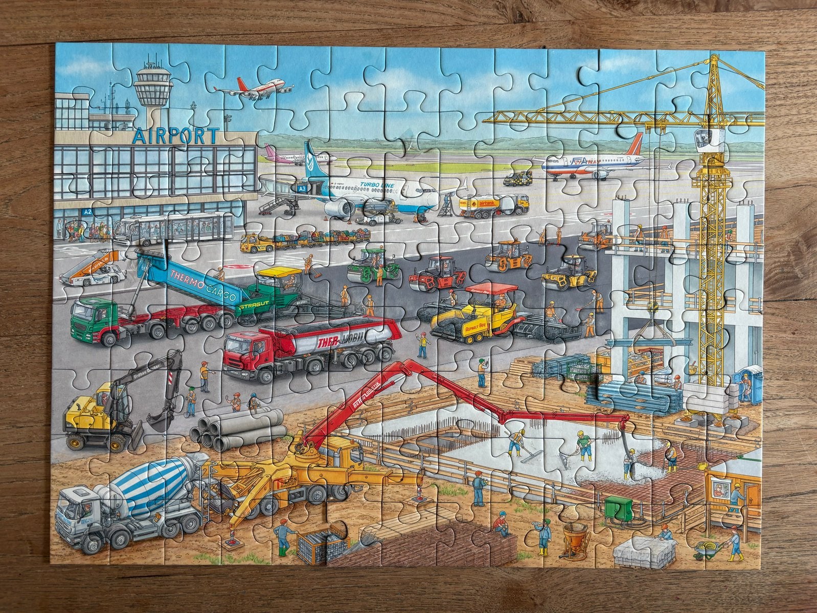 Ravensburger XXL 100 stukjes puzzel - Luchthaven bouwplaats, Ophalen of Verzenden, Gebruikt, 6 jaar of ouder
