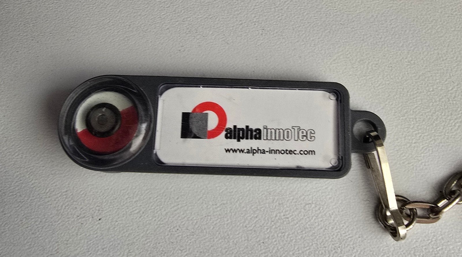 Sleutelhanger Alpha InnoTec - Zo goed als nieuw, Ophalen of Verzenden