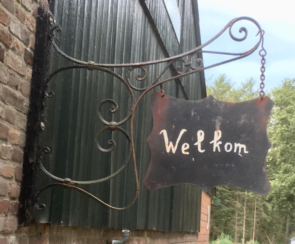 Uithangbord antiek buitenbord reclame winkel gietijzer, Ophalen